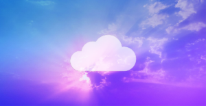 A transparent cloud icon in front of a cloudy blue and purple sky.
